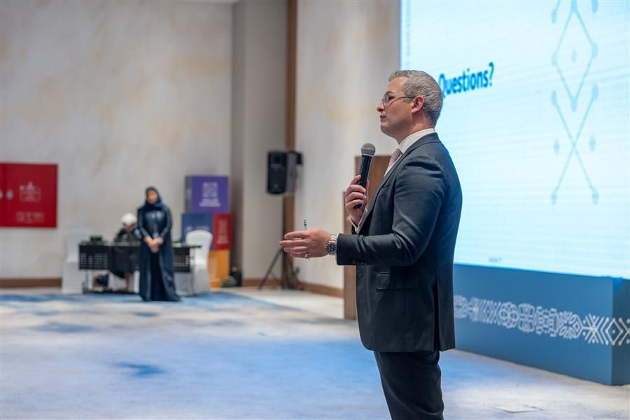 Man delivering a presentation during a training program